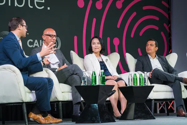 Ju Hui Lee, center, at the Cayman Alternative Investment Summit. (Courtesy photo)