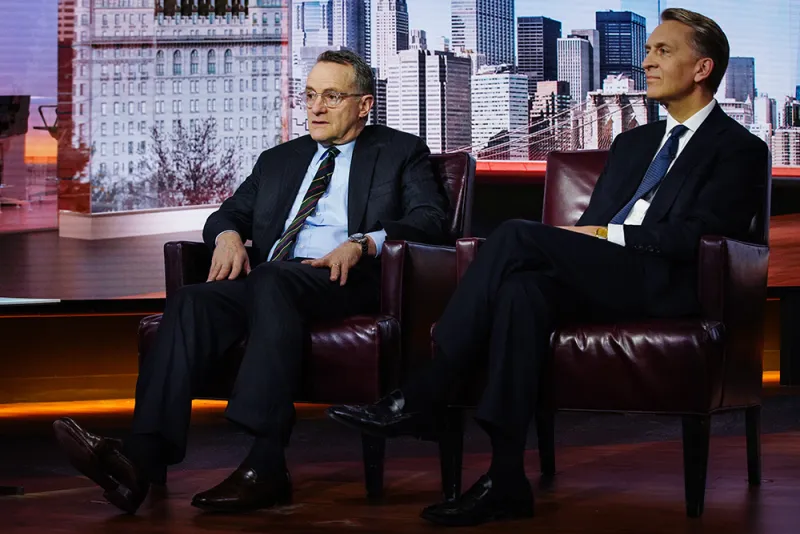 Howard Marks, co-founder of Oaktree Capital and Bruce Flatt, CEO of Brookfield Assest Management. (Christopher Goodney/Bloomberg)